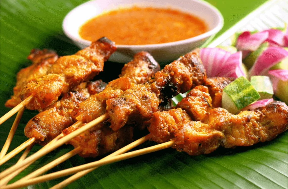 Grilled satay skewers served with peanut sauce